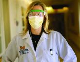 Dr. Valerie Vaughn wearing PPE at Michigan Health